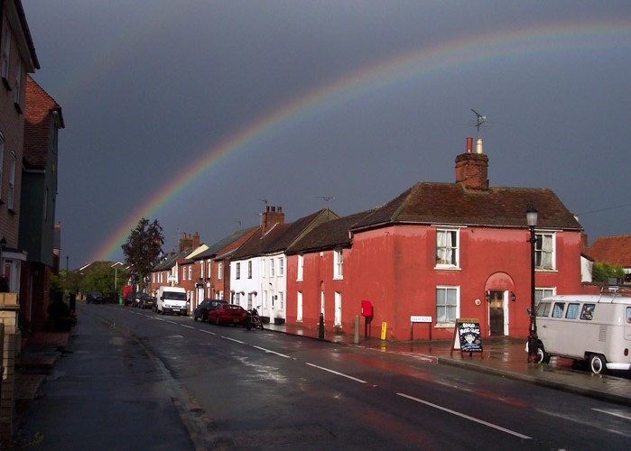 rainbow over village